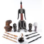 Tribal art. Miscellaneous African and other carved wood heads and other objects, including a wood,