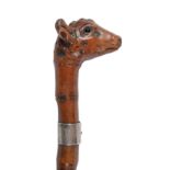 Folk art. An unusual Victorian carved bamboo cane,Â the pommel in the form of the head of a cow with