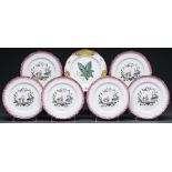 One and a set of five Wedgwood Queens Ware plates, 1907 and circa, painted with a large green and