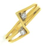A diamond crossover ring, in gold wirework, marked 18ct, 3.5g, size O½ ConditionGood condition