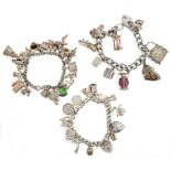 Three silver charm bracelets, various lengths, each with a varied collection of charms, 6ozs