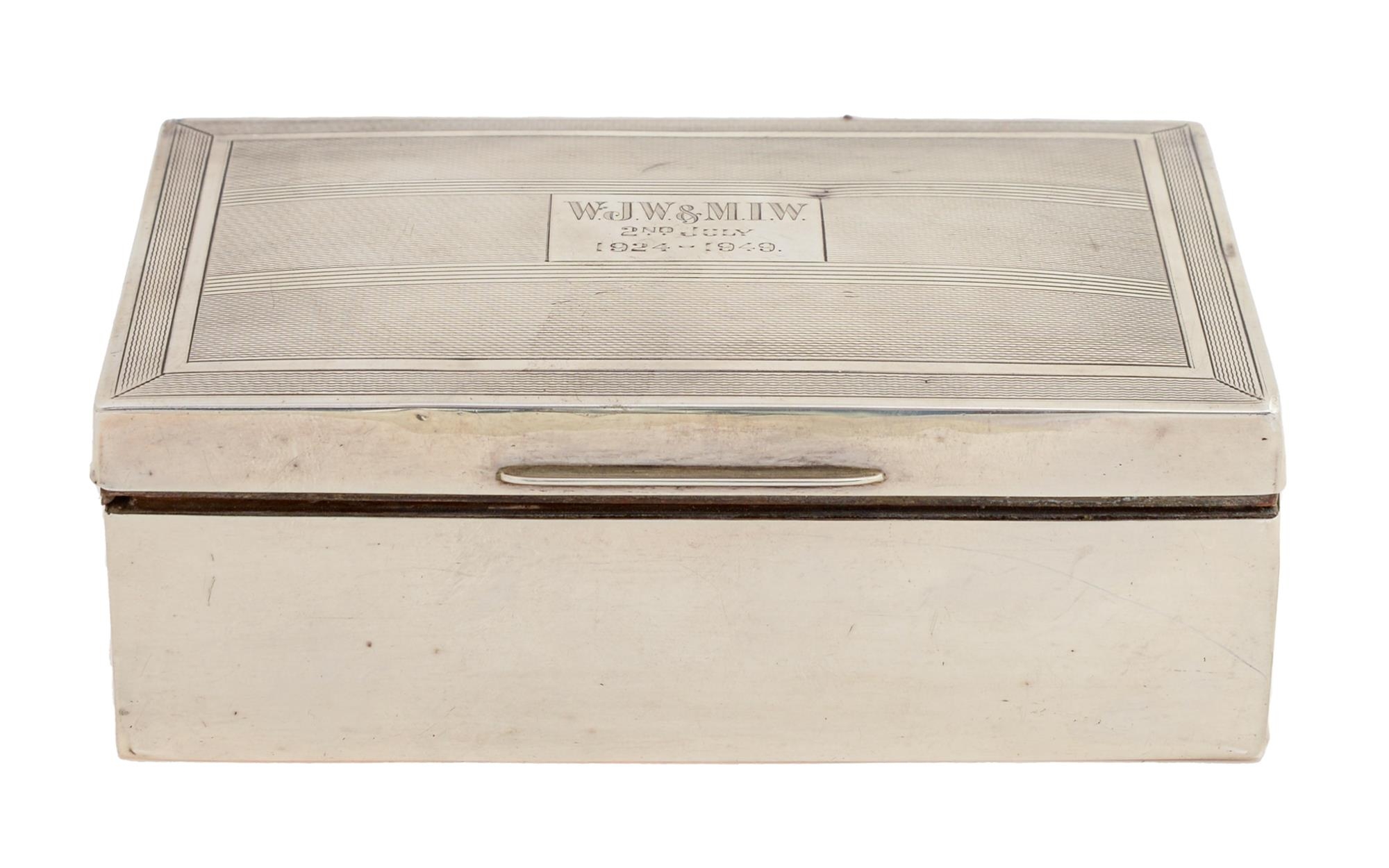 A George VI silver cigarette box, the lid engine turned, cedar lined, 13.5cm l, by J B