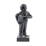 A German bronze of a ragged newspaper boy, early 20th c, base inscribed Speshul, 17cm h