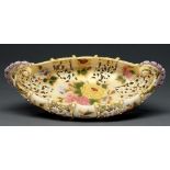 A Zsolnay pierced and scroll handled bowl, late 19th c, decorated with flowers and gilt, 35cm l,