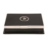A George V silver mounted ebony cigarette box, the lid inset with a Wedgwood black jasper medallion,