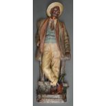 A Bernard Bloch cold painted terracotta figure of a black boy, c1890-1900 ConditionBack and part