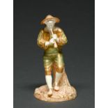A Royal Worcester figure of Strephon the boy piper, 1949, decorated in shot enamels, 15cm h,