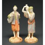 A pair of Royal Worcester figures of eastern water carriers, 1895 and 1896, designed by James