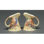 A pair of Locke & Co Worcester jugs, c1900, painted by J Lewis, both signed, with a peacock, 8.