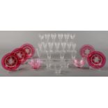 A set of five Victorian cranberry flashed and cut glass ice plates, 17cm diam, two bowls and