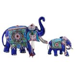 A pair of Indian silver coloured metal and 'jewelled' enamel models of an elephant and calf, 20th c,
