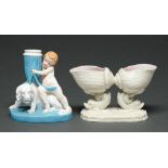 A Royal Worcester boy and dog candlestick and glazed parian double shell and dolphin vase, 1876