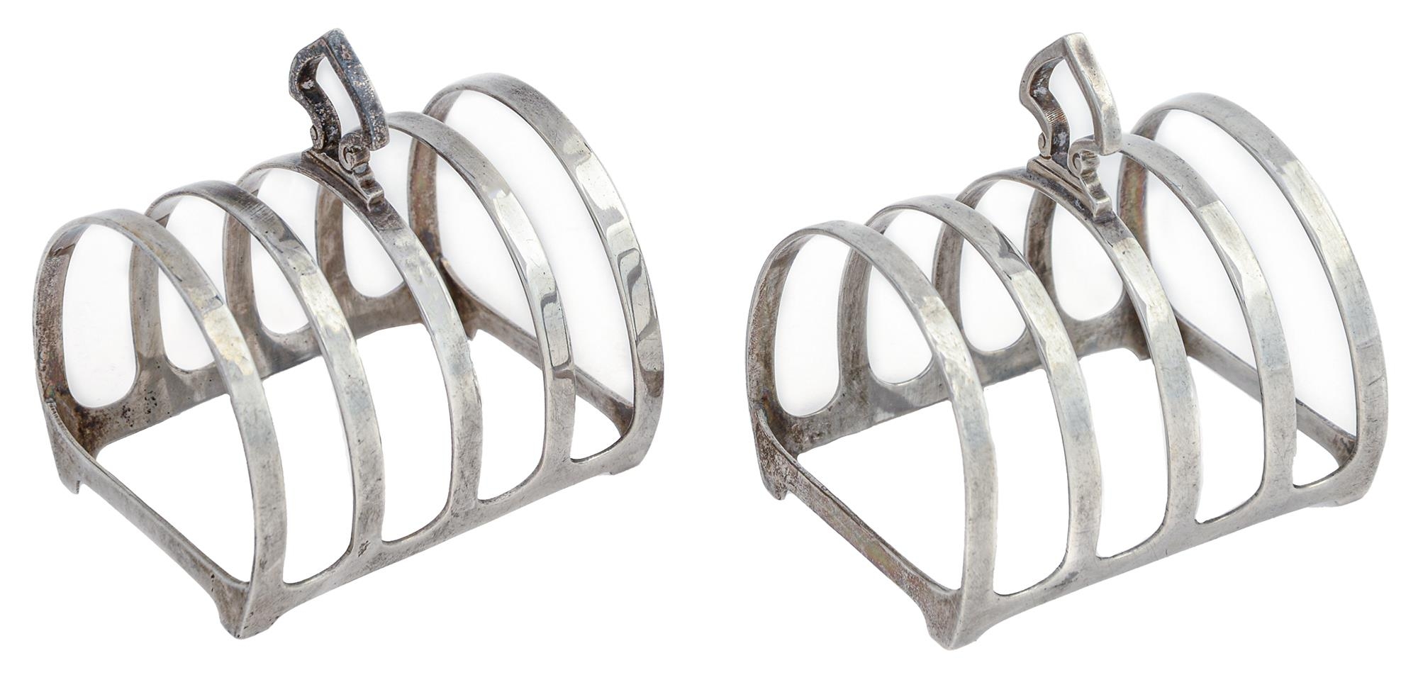 A pair of George VI five hoop silver toast racks, 80mm l, by Mappin & Webb Ltd, Sheffield 1945,