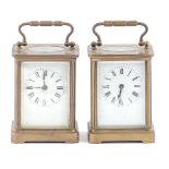 Two French brass carriage timepieces, early 20th c, of similar form, 11cm h excluding handle