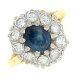 A sapphire and diamond cluster ring, in 18ct gold, Convention marked, 5.5g, size N ConditionGood