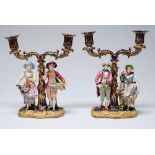 A pair of Minton "Double Figure candlesticks", or candelabra, c1836, as a youth and girl with