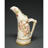 A Royal Worcester tusk ice jug, 1888, decorated with flowers heightened in gilt on an ivory ground,