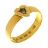 A 22ct gold wedding ring, applied at later date with a gypsy set sapphire within a heart,