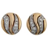 A pair of diamond ear studs, of bean design, in gold, 11mm, one pricked 18k, the other unmarked, 4.