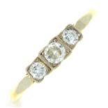 A three stone diamond ring, gold hooped marked 18ct PLAT, 2.7g, size N ConditionSlight wear