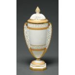 A Grainger's Worcester reticulated vase and cover, c1890, with jewelled gilt borders, 29cm h,