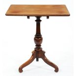 A Victorian mahogany tripod table, the tip-up top on baluster pillar and scroll legs, 74cm h; 61 x