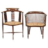 Two Edwardian mahogany and line inlaid salon chairs,Â with padded kidney shaped or shield shaped