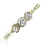 A three stone diamond ring, gold hoop marked 18ct PLAT, 2g, size L½ ConditionGood condition