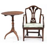 A George III mahogany tripod table, 71cm h; 60cm diam and a contemporary fruitwood elbow chair, with