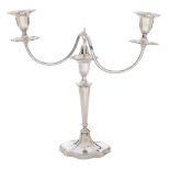 An Elizabeth II silver candelabrum, with reeded branches and rims, 34.5cm h, by Walker & Hall Ltd,