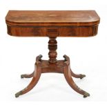 A George IV mahogany card table, the D-shaped fold-over top centred by harewood ground shell patera,