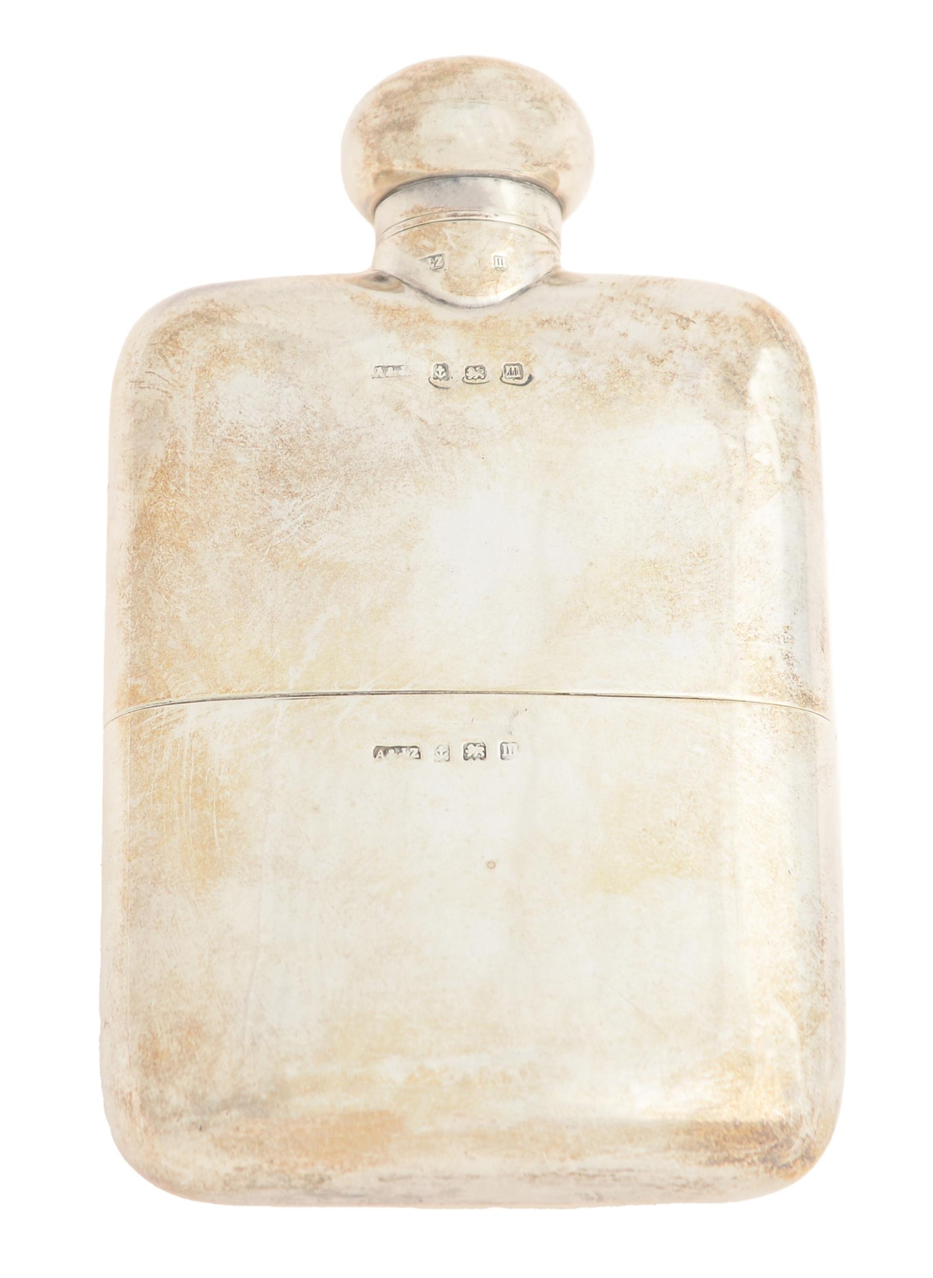 A George V silver hip flask and beaker, 12cm h, by A & J Zimmerman, Birmingham 1911, 5ozs