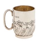 A Victorian silver christening mug, spirally reeded and chased with flowers, 78mm h, by W Hutton &