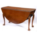 A George II mahogany gateleg table, on carved cabriole legs and claw and ball feet, 72cm h; 128 x