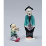 A Royal Worcester figure of a Chinese boy and another from the Countries of the World series, mid