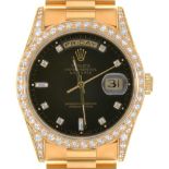 A Rolex 18ct gold gentleman's wristwatch, Oyster Perpetual Day-Date, with black dial, diamond