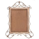 An Edwardian silver photograph frame, with wirework surround, bevelled glass and wood back with