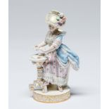 A Meissen figure of a card player, late 19th c, after the model by M V Acier, the young lady in