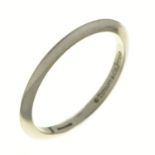 Tiffany & Co. A platinum wedding ring, signed ©Tiffany & Co, London, date letter obscured, possibly