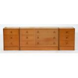 A pair of Stag light oak bedside chests and a chest of drawers en suite, c1970, pair 68cm h; 43 x