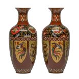 A pair of Japanese cloisonne enamel vases, Meiji period, in two  brown ground registers and