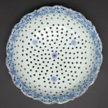 A Chinese export blue and white cress dish, late 18th c, the border to the interior painted with