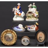 A Staffordshire porcelaneous flatback equestrian figure of Napoleon and another of a goat girl,