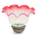 A semi opalescent and cranberry shaded glass lampshade, early 20th c, with oxidised metal mount,