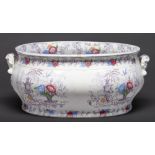 A Staffordshire lilac printed and enamelled earthenware footbath, c1870, with chinoiseries and