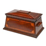 A Victorian fiddle back and figured mahogany tea chest of sarcophagus shape, with line inlay and