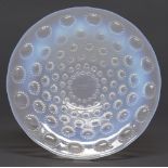 Asters.  A Lalique semi opalescent glass dish, 25cm diam, etched mark R LALIQUE FRANCE Minute flea