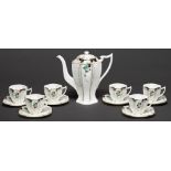 A Shelley Damsons pattern coffee service, 1928, of Queen Anne shape, coffee pot and cover 19cm h,