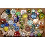 A collection of millefiori and other glass paperweights, including Perthshire, Maltese and other