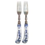 A pair of electro-plated dessert forks with  French blue and white pistol hafts,  painted  in the